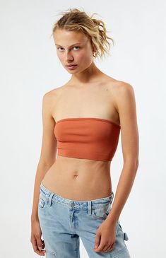 The Seamless Tube Top from Contour features a sleek, strapless design crafted from luxurious seamless ribbed fabric for ultimate comfort and style. Its cropped length makes it perfect for pairing with high-waisted jeans or skirts, adding a chic touch to any outfit.


	Seamless ribbed fabric
	Good stretch
	Straight neckline
	Strapless
	Cropped length
	Fitted
	94% polyamide, 6% elastane
	Machine washable
	Model is wearing a size small Casual Ribbed Strapless Tube Top, Stretch Cropped Tube Top, Bra Friendly, Bra Friendly Cropped Stretch Tube Top, Stretch Cropped Tube Top Bra Friendly, Stretch Ribbed Tube Top, Versatile Seamless Bandeau Crop Top, Casual Stretch Tube Top With Bra-friendly Design, Casual Stretch Tube Top Bra Friendly, Seamless Stretch Strapless Crop Top