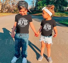 Raise a child that knows God loves them when they wear this Christian t-shirt! Represent God's love with this kid's Christian t-shirt.    Q U I C K * F A C T S * ✺ 100% Airlume combed and ringspun cotton (fiber content may vary for different colors) ✺Extra light fabric (3.9 oz/yd² (132 g/m ✺Tear-away label    S I Z I N G * ✺ Sizing is unisex so runs like men's,loose fit. ✺ We recommend selecting an item from your closet that fits well and comparing the item's measurements to the numbers above to Kids Christian Shirts, Christian Kids Shirts, Christian Graphic Tees, Christian Shirts Designs, Christian Kids, Jesus Shirt, Religious Shirt, Christian Apparel, Christian Shirt