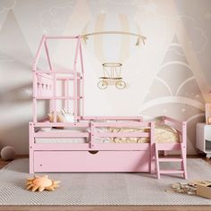 a child's bedroom with pink furniture and decor