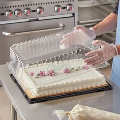 Send your delectable cakes home with your customers with this Choice 1/2 size high dome sheet cake display container with clear dome lid. This cake container is designed to hold a half a sheet cake, 2-3 layers high. Use it at your bakery, convenience store, or grocery store. The clear plastic lid is lightweight and offers optimum visibility of your high-end baked goods to increase impulse sales without needing to lift the lid. At the same time, the sleek black base offers an attractive way to me Sheet Cake Stand, 2024 Cake, Cake Container, Kitchen 2023, Nursing Cake, Whiskey Cake, Cupcake Container, Cake Storage, Texas Sheet