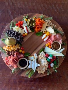 a wooden platter filled with different types of food