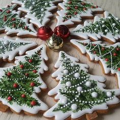 decorated cookies arranged in the shape of christmas trees