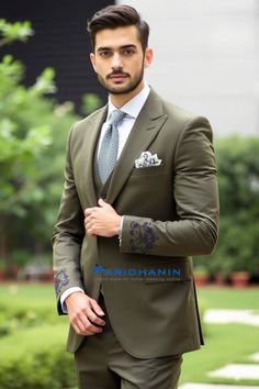 =>UNIQUE CREATION - PLEASE RESPECT COPYRIGHT<= All images and content on this site are exclusively crafted and owned by Paridhanin. Unauthorized copying, sharing, or reproduction is prohibited and will be subject to legal action. This olive green wedding suit is designed for the contemporary groom. Featuring subtle yet intricate embroidery on the cuffs, it offers a perfect blend of tradition and modernity. Made from high-quality fabric, this suit provides a sharp and tailored fit, ideal for making a stylish statement on your special day. The price includes Jacket, pant and vest only. Other accessories if you want like shirt , tie and pocket square will be available on extra cost. For this message us in personalisation box. The suit is meticulously crafted from a luxurious  polyester blende Olive Suit Men, Olive Green Wedding Suit, Olive Suit, Outfit For Groom, Wedding Suit For Men, Olive Green Wedding, Olive Green Suit, Green Wedding Suit, Army Green Coat