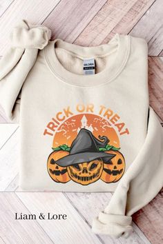 All our orders are custom made and we look forward to making this for you! We use Direct-To-Garment printing, which produces high-quality, vibrant designs with no cracking.

This sweater is designed with a loose fit, or you can size up for an even cozier fit! The Trickster, Party Sweaters, Funny Horror, Pumpkin Face, Fall Tee, Cozy Fits, Funny Sweatshirts, Unisex Shorts