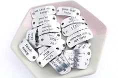 there are many tags that say i love you more than others on the tag holder