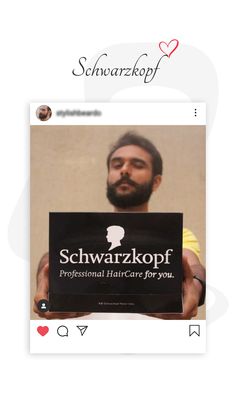 a man holding up a sign that says schwarzwarkopf