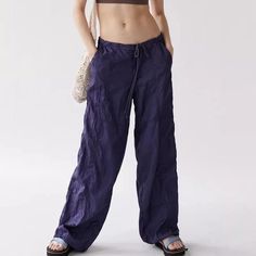 In Navy Size Xxsmall Measurements Flat: Waist 13.5", Hip 18", Rise 10", Inseam 31" Low Rise Cargo Parachute Pants, Relaxed Fit, Zip And Button Closure, Wide Leg, Drawstring Ankles And Waist Nwt Condition, No Flaws Y2k Blue Bottoms With Cargo Pockets, Blue Y2k Bottoms With Cargo Pockets, Y2k Blue Full-length Pants, Y2k Style Blue Full Length Pants, Y2k Style Full Length Blue Pants, Blue Full Length Y2k Pants, Blue Mid-rise Y2k Style Pants, Blue Stretch Y2k Pants, Blue Relaxed Fit Cargo Pants For Summer