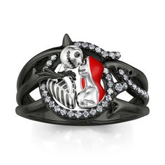 Have you heard the love story between scarecrow-like creation and skeleton? This ring is the classic scene that they share a passionate kiss on top of Spiral Hill. Crafted in black-tone sterling silver and exquisitely designed, it holds an iconic figure of skull couple atop Spiral Hill. As a great Halloween and Christmas gift, the meaningful ring celebrates your everlasting love.Carat Weight: 0.226 ctStone Size: 0.8,1 mmStone Type: Jeulia® StoneNumber of Stones: 37 Stone Shape: RoundStone Color: Diamond WhiteWeight: 5.81 gWidth: 2.6 mmThickness: 1.3 mmMaterial: 925 SilverPlating Color: Silver, Black Wringer Washer, Delicate Wedding Ring, Meaningful Rings, Skull Couple, Skeleton Ring, Skull Engagement Ring, Artistic Earrings, Gothic Engagement Ring, Jack Skeleton