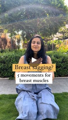 a woman sitting on the grass holding a sign that says breast sagging? 5 movements for breast muscles