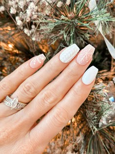 Make your winter manicure shine with this white snowflake design and an eye-catching cable knit accent nail. Perfect for frosty vibes! Christmas Bride Nails, Sweater And Snowflake Nails, Christmas Nails With Sweater Nail, Short Square Sweater Nails, Cream Sweater Nails, Snowflake Sweater Nails, Dip Nail Ideas Almond, Sweater Print Nails