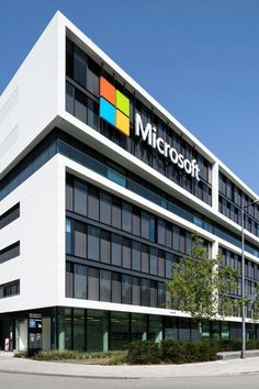 an office building with the microsoft logo on it