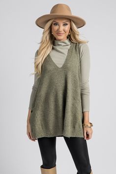 BEST SELLER, NEW COLOR!

This sweater vest is effortlessly chic. Sage green with a flowy shape, tunic length, and a V-neckline. Patch pockets complete the look. Tunic Outfit, Long Sweater Vest, Long Sleeve Layering, Pocket Sweater, Blue Door, Mock Neck Top, Layered Tops, Tunic Length, Sweater Vest