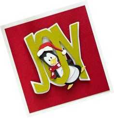 a penguin with a hat and scarf on it's head is standing in front of the letter y