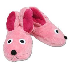 a pair of pink slippers with black eyes and ears on the bottom one has a dog's nose