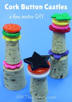 cork button castles with a black star on top and four different colored tops, sitting in front of a blue background