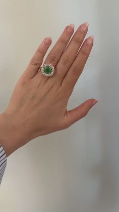 Ring crafted in 18k yellow gold with a stunning 3.59ct Oval E/W Tsavorite center with 2.03ct white round brilliant Diamond halo.  This ring is a size 7. This piece was handmade in Los Angeles. It is ready for immediate shipping. Tsavorite Ring, Custom Signet Ring, Bezel Ring, Ring Crafts, Diamond Halo, Brilliant Diamond, Signet Ring, Charm Earrings, Halo Diamond