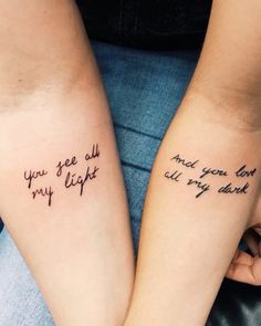 two people with matching tattoos that say you see all my light