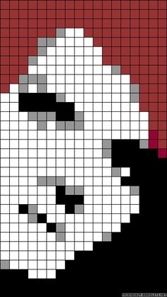 a cross stitch pattern that looks like a skull with red and white squares on it