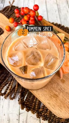 pumpkin spice white russian cocktail in a glass with ice