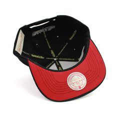 Show your support for the Chicago Bulls with this Munch Time snapback from Mitchell & Ness. The hat features a polyester, wool-feel crown and tonal black top visor, home color undervisor, raised and flat front embroidery, a sublimated top visor with a faux suede overlay, Mitchell & Ness logo embroidery at back with a snap closure. Style: HHSS5725CBUYPPK Classic Snapback Hat With Visor For Streetwear, Classic Adjustable Snapback Visor Hat, Classic Adjustable Visor Snapback Hat, Adjustable Streetwear Hat With Sweatband, Adjustable Black Visor For Streetwear, Black Adjustable Visor With Curved Brim, Adjustable Black Visor With Curved Brim, Classic Black Snapback Hat For Sports Events, Classic Adjustable Snapback Hat For Sports Events