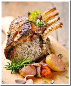 a piece of meat and vegetables on a cutting board