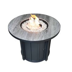 an outdoor fire pit is shown with ice and water in it's centerpiece