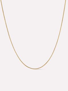 Add something timeless to your stack with this classic gold chain. Crafted in recycled solid gold and designed to last a lifetime, this box chain necklace features cubed links and a sleek design that pairs well with all your favorite jewelry. Create a seriously chic look that’ll stand the test of time and pair this necklace with our Gold Classic Hoops. • Crafted in recycled solid gold • Sleek box chain necklace • Pairs well with other jewelry Mini Box, Box Chain Necklace, Solid Gold Chains, Gold Box, Classic Gold, Letter Necklace, Online Jewelry Store, Box Chain, Gold Chain