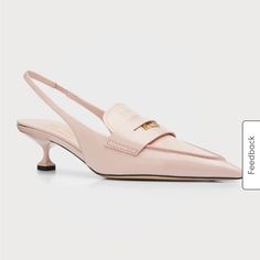 New In Box Miu Miu Patent Leather Penny Loafer Pumps 1.75 In / 45 Mm Kitten Heel Pointed Apron Toe Notched Vamp With Keeper Strap Stretch Halter Slingback Lining: Leather Made In Italy About Miu Miu: Miu Miu, From Miuccia Prada, Made Its Debut In 1993, And The Offshoot Of Core Collection Prada Has Become A Star In Its Own Right. Miu Miu Is An Outlet For Ms. Prada's Avant Garde Imagination. The Collection Includes Ready-To-Wear, Shoes, Handbags, And Accessories. Luxury 4-inch Slingback Kitten Heels, Designer Slingback Pumps With 4-inch Heel And Pointed Toe, Luxury Slingback Kitten Heels With 4-inch Heel, Luxury Slingback Kitten Heels With Sculpted Heel, Luxury Slingback Kitten Heels With Heel Strap, Designer Pointed Toe Sandals For Work, Miu Miu Luxury Open Heel Heels, Luxury Miu Miu Open Heel Heels, Designer Slingback Pumps With 4-inch Heel