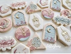 some decorated cookies are laying on a table