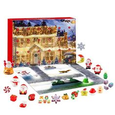 a christmas jigsaw puzzle with santa's house in the background and decorations around it