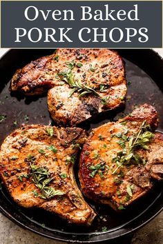 oven baked pork chops in a cast iron skillet with herbs and seasoning on top