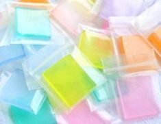 many different colored squares are in plastic bags