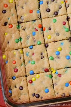 a pan filled with cookies and candy bars