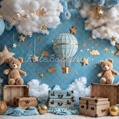 teddy bears are sitting on suitcases in front of a wall with clouds and stars