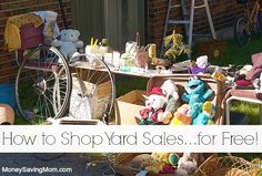 an outdoor flea market with lots of stuffed animals and toys on the ground in front of it