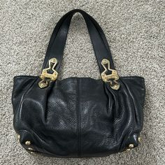 This Is A Gorgeous, Extremely Clean Bag With No Flaws! Black Leather And Gold Studded Michel Kors Hobo Bag. The Leather Is Extremely Supple, Yet Sturdy, And Doesn’t Have Any Scrapes, Cuts, Or Flaws. See Photos For Cleanliness And Quality. Comment With Any Questions! Michael Kors Soft Leather Tote Shoulder Bag, Michael Kors Shoulder Bag With Gold-tone Hardware, Designer Michael Kors Shoulder Bag With Metal Hardware, Black Leather Satchel With Brass Hardware, Formal Black Hobo Bag With Metal Hardware, Michael Kors Double Handle Soft Leather Shoulder Bag, Michael Kors Soft Leather Shoulder Bag With Double Handle, Michael Kors Leather Bag With Gold-tone Hardware, Michael Kors Bags With Metal Hardware For Daily Use