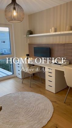 a home office with desk, chair and computer on the table in front of a large window