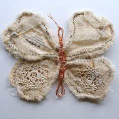 an old piece of cloth that has been made into a butterfly