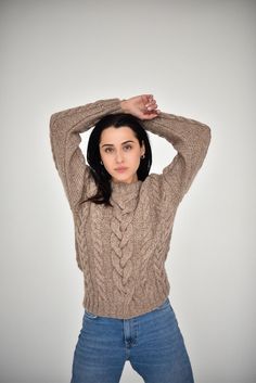 "Beige cable knit women pullover wiht round neck. Product Details: * 100% hand knit * 75% alpaca, 25% merino wool. Regular fit. Size: S(4-6) M(8-10) L(12-14) S Width : 46/48 cm Length: 58/60 cm M Width : 50/52 cm Length: 60 cm L Width : 54 cm Length: 62 cm Please let me know your size. It is made for order. If you would like me in other size, you could request a custom order with your own parameters: your height, bust and length of the sweater from the shoulder in cm. Or add your comments about Cableknit Sweater, Alpaca Sweater, Women Sweater, Pullover Sweater Women, Women Pullover, Cable Knit, Alpaca, Pullover Sweaters, Hand Knitting