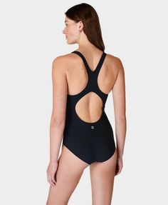 Our new racerback swimsuit designed for lifestyle and lane swimming . Part-recycled fabric is resistant to damage from chlorine and UV50+ rays . Smoothing, sculpting fit with medium-rise leg  . Inner bra support with removable pads . Front length: 76cm / 30” . Model wears size S and is 178cm/5'10" tall. Style Code: SB9626Colour: Black Compressive Sports Swimwear With Built-in Padding, Sporty Tankini With Built-in Padding For Swimming, Functional Moisture-wicking Swimwear, Functional Moisture-wicking Elastane Swimwear, Fitted Technical Swimwear For Swimming, Technical Fitted Swimwear For Swimming, Functional Compression Swimwear For Sports, Compressive Sleeveless Swimwear For Sports, Black Compressive Functional Swimwear