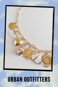 Each piece is unique and the one you receive will vary from what you see here. One of a kind ocean vintage charm necklace featuring assorted dead stock charms. All charm necklaces are handcrafted and include a range of 11 to 15 charms. Content + Care Chain: gold plated Charms: variety of vintage raw brass, resin, acrylic, zinc alloy, glass, crystal, and gold plated Please note: vintage raw brass charms, which are incorporated in all necklaces, are lightweight and have hollow backings. All neckla Ocean-inspired Charms For Jewelry Making, Ocean-inspired Dangle Charms Jewelry, Vintage Jewelry With Dangling Charms As Souvenir, Vintage Jewelry With Dangling Charms Souvenir, Vintage Dangling Charms Jewelry Souvenir, Souvenir Pendant Charm Necklaces, Vintage Beach Dangle Earrings, Gold Ocean-inspired Jewelry With Dangling Charms, Ocean-inspired Gold Jewelry With Dangling Charms