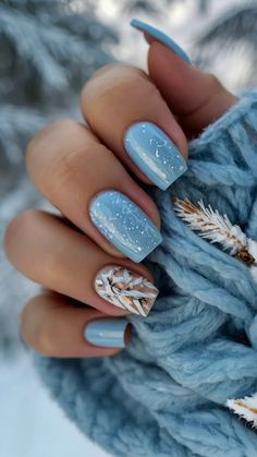 Frosty Fun: 20+ Simple Nail Design Ideas for Winter 41 January Nails Short Blue, Winter Vacay Nails, Winter Nails Ice Blue, Winter Blue Chrome Nails, Ice Themed Nails, January Nail Art Ideas, Snowglobe Nail Art, Winter Teal Nails, Simple January Nails Short