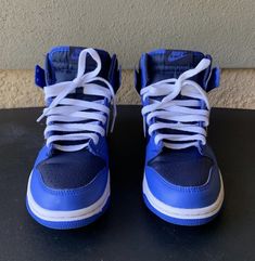 Great condition blue Nike dunks size 6Y. Nike Dunk High Blue Satin, Nike Dunks High Dark Blue, Blue Nike Dunks, Nike Dunk High, Dunk High, Blue Nike, Nike Dunk, Nike Dunks, Athletic Shoes