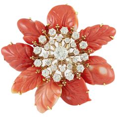 Finely crafted in 18k yellow gold with carved corals and round cut diamonds. The center diamond weighs approximately 1.05 carats while surrounding smaller diamonds weigh approximately a total of 4.00 carats. Signed by David Webb. Circa 1970s. Original certificate available Diamond Flower Brooch, Buttercup Flower, Van Cleef And Arpels, David Webb, Coral Flowers, Diamond Eyes, Turquoise Flowers, Diamond Brooch, Pink Agate