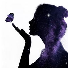 the silhouette of a woman holding a butterfly in her hand, with stars on it