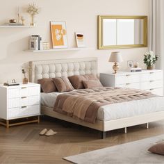 a bed room with a neatly made bed and two nightstands next to each other