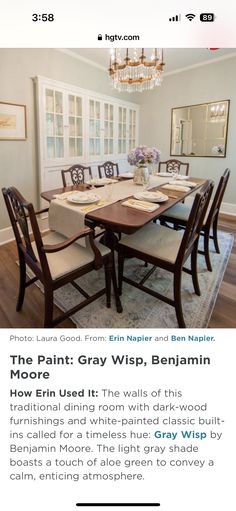 a dining room table with chairs and a chandelier