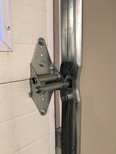 an open door with a metal handle on it