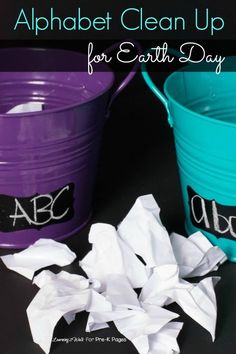 two buckets with toilet paper in them and the words alphabet clean up for earth day