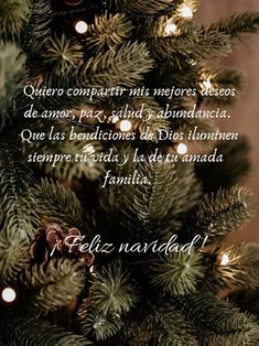 a christmas tree with some lights on it and a poem written in spanish above the image